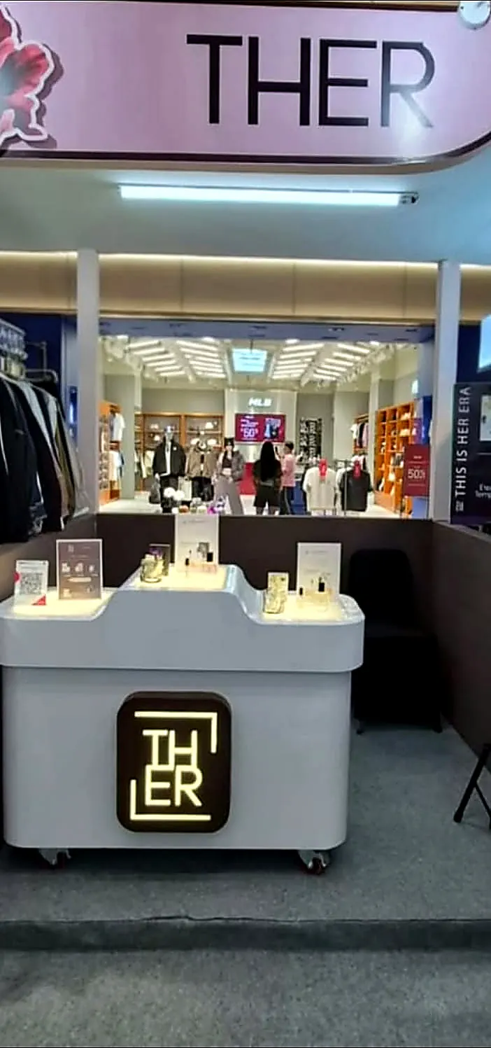 THER booth display and offline brand presence